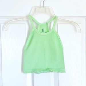 Happiness runs crop tank